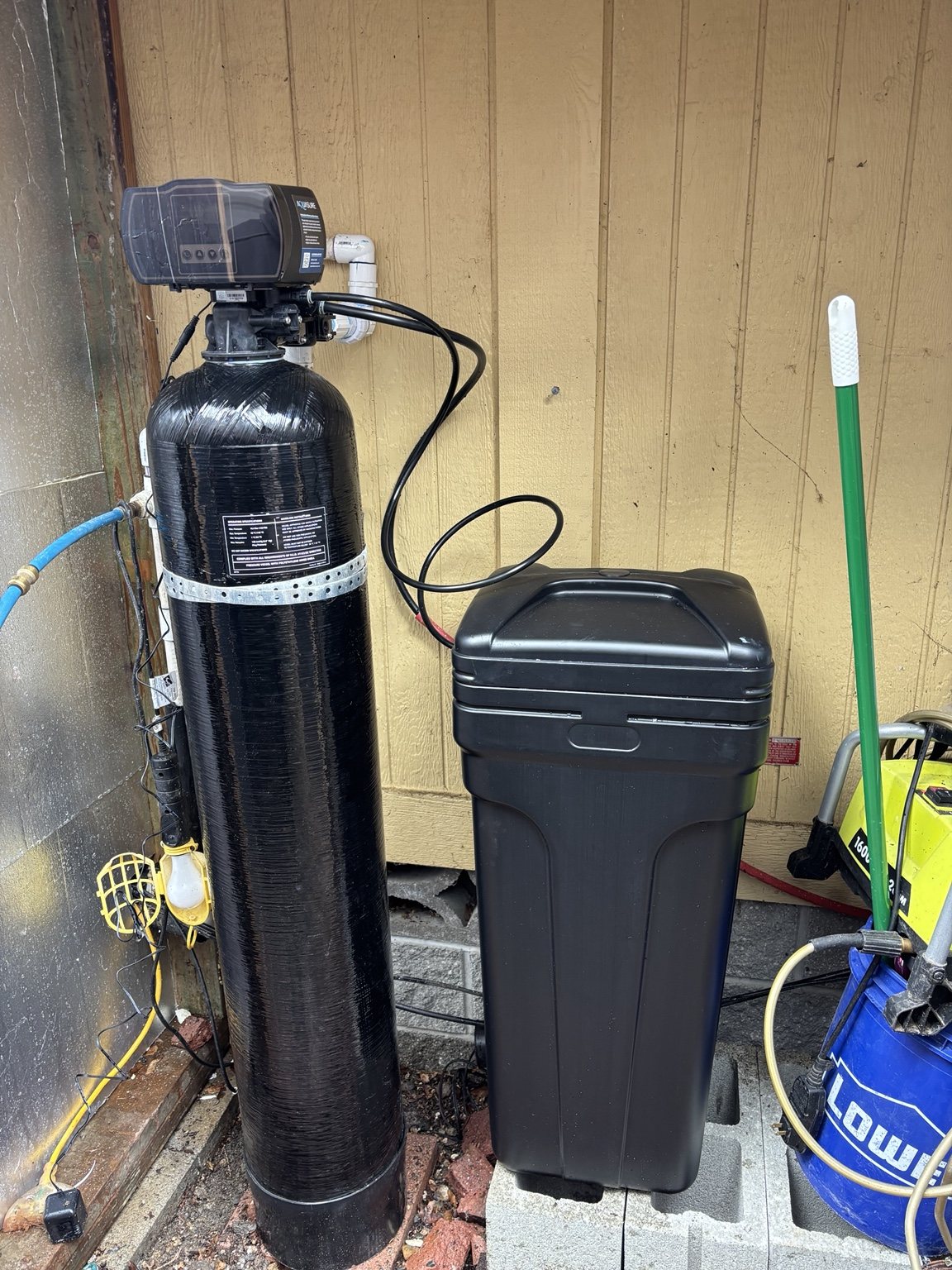 Whole-home water treatment system installation